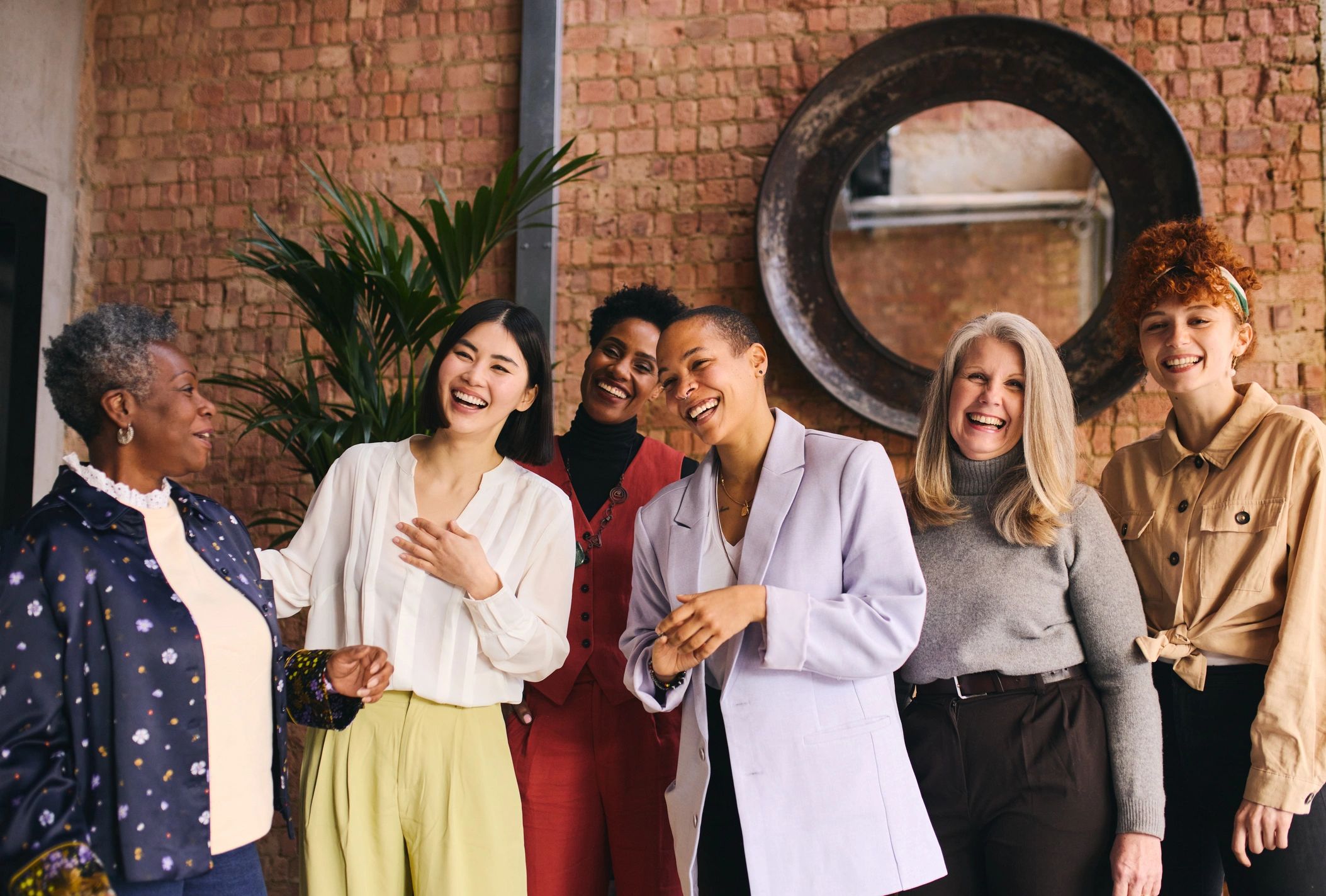 Women smiling together in fellowship