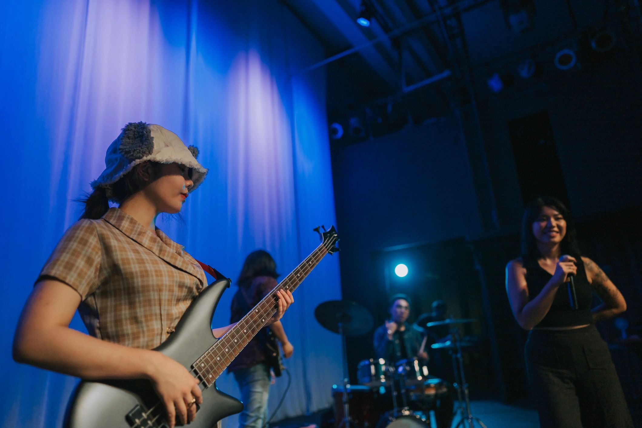 Guitarist serving during live worship