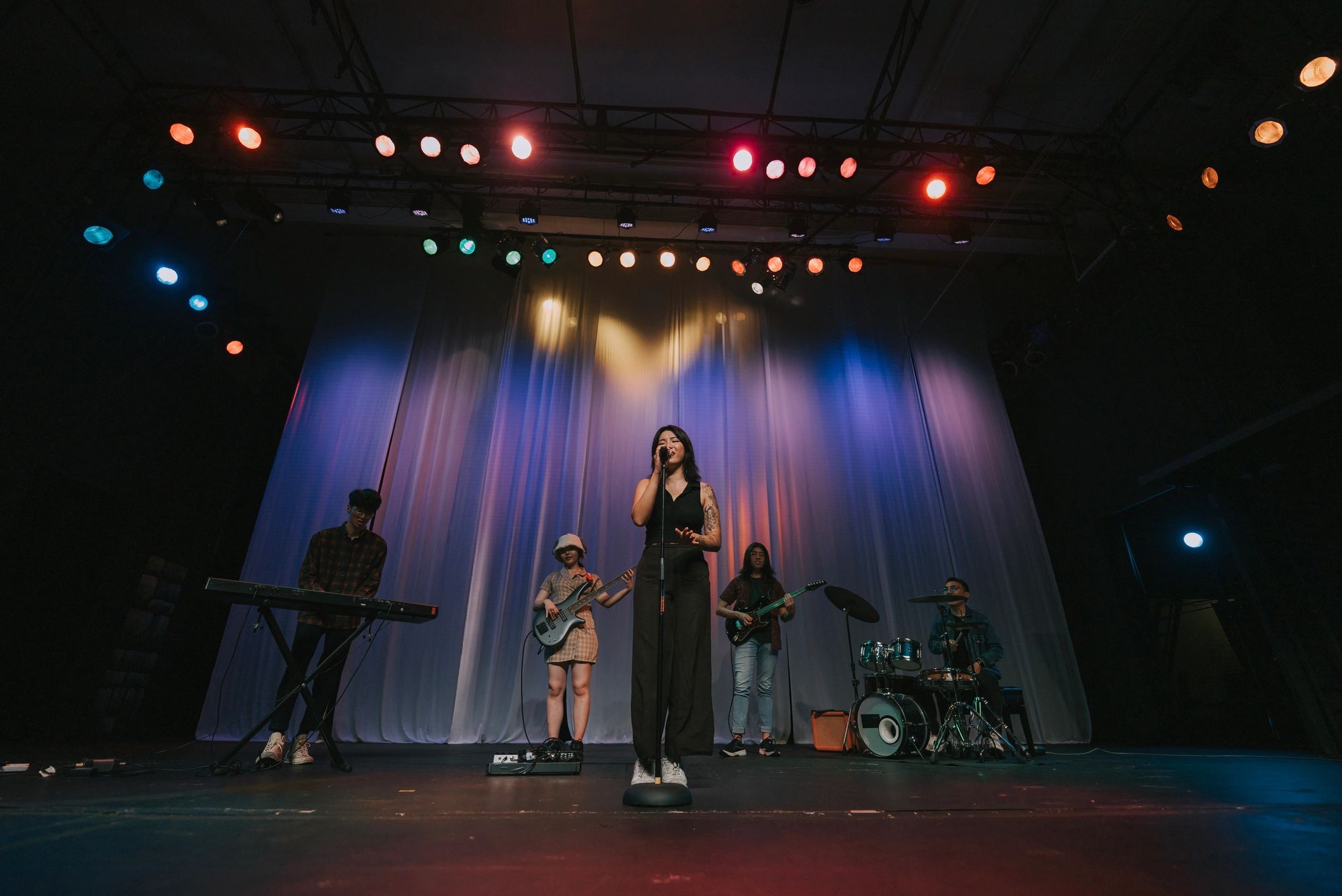Live worship band serving together on stage