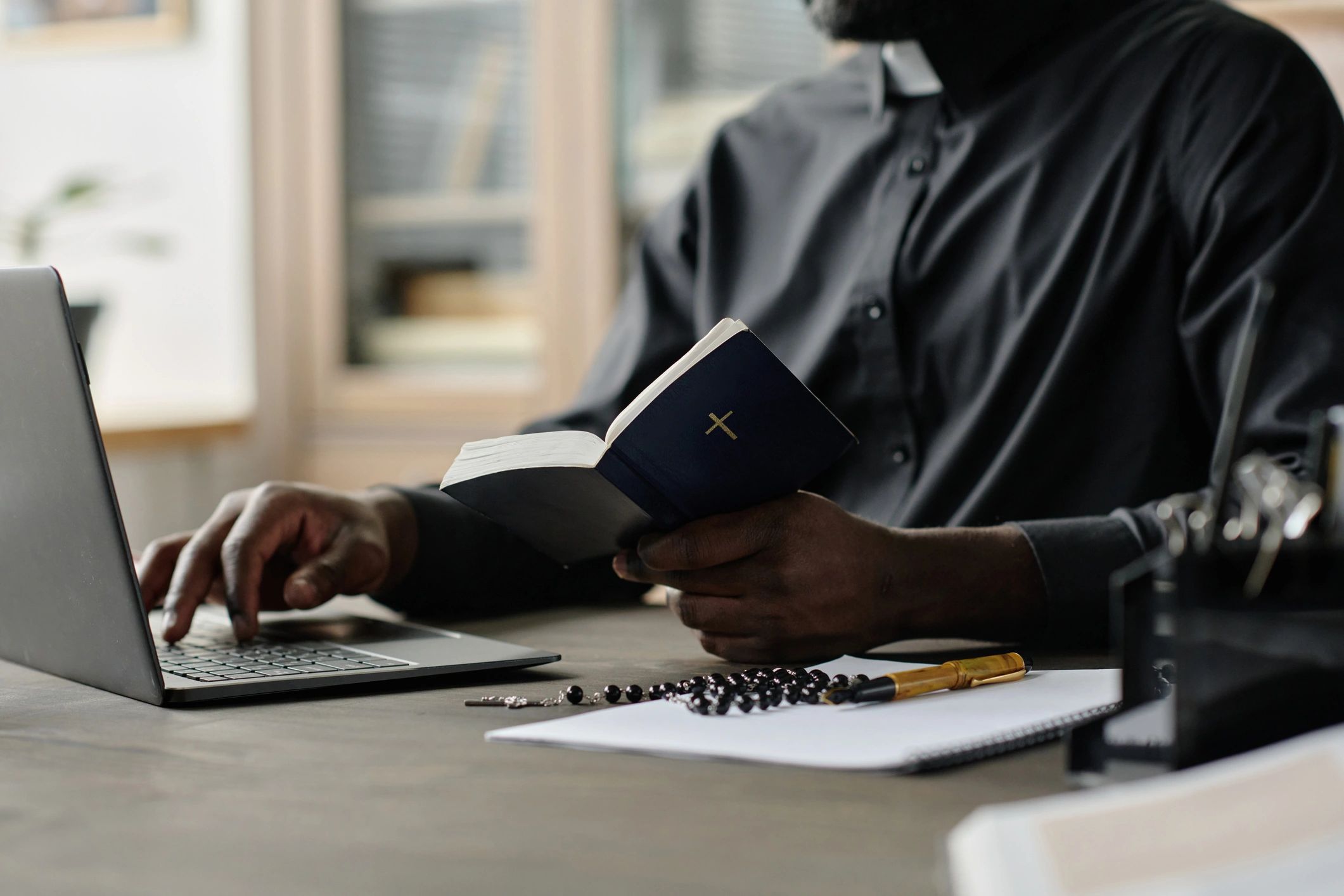 Pastor studying Scripture in church office