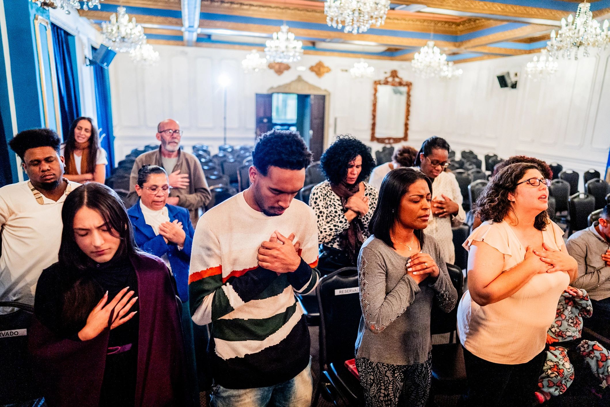 Church members praying together
